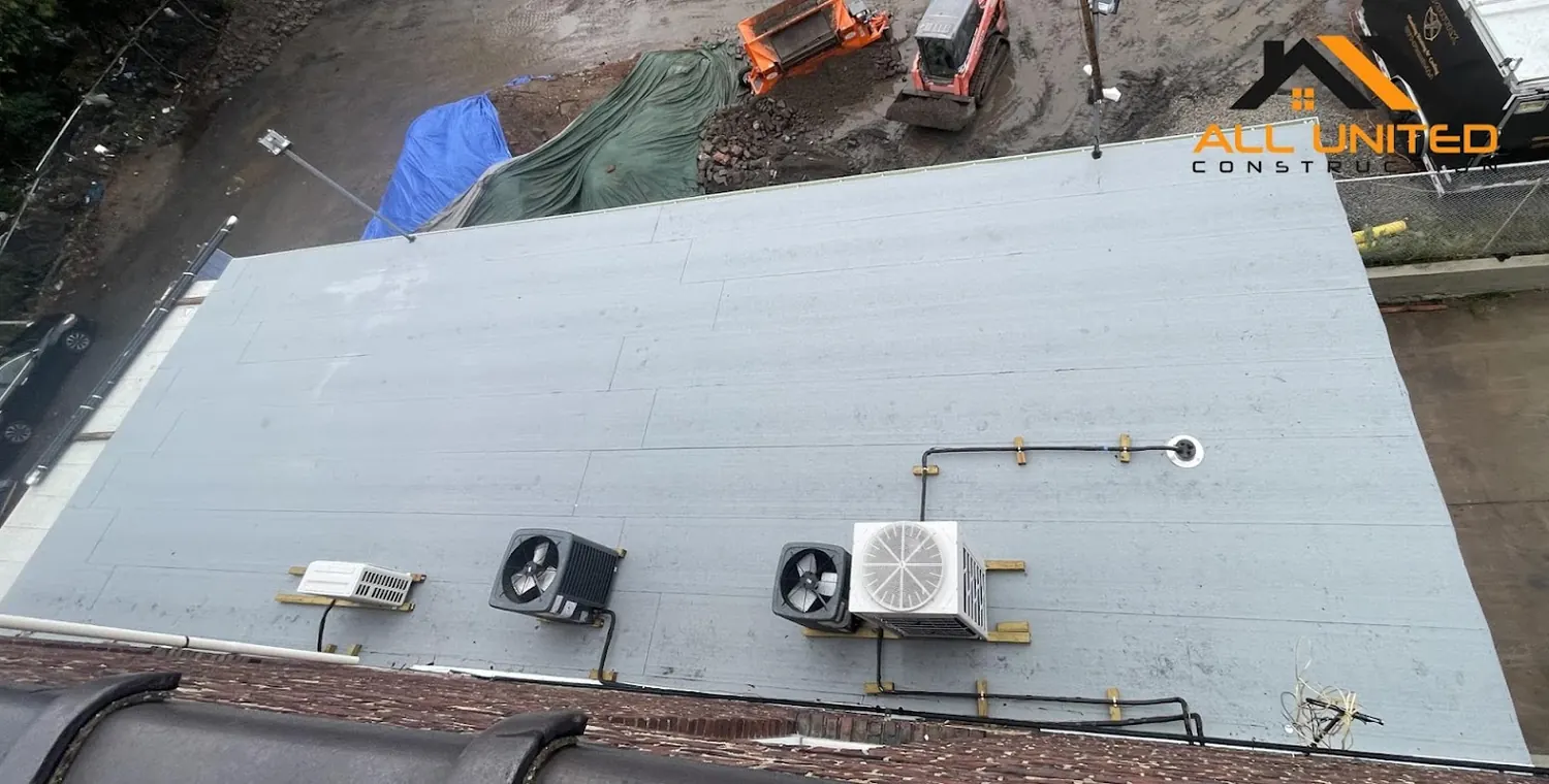 Finished commercial flat roof surface by All United Construction in New Jersey